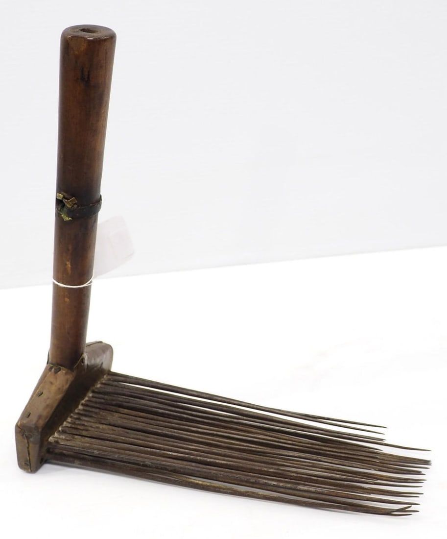 Lot 611: Early wood & brass flax comb