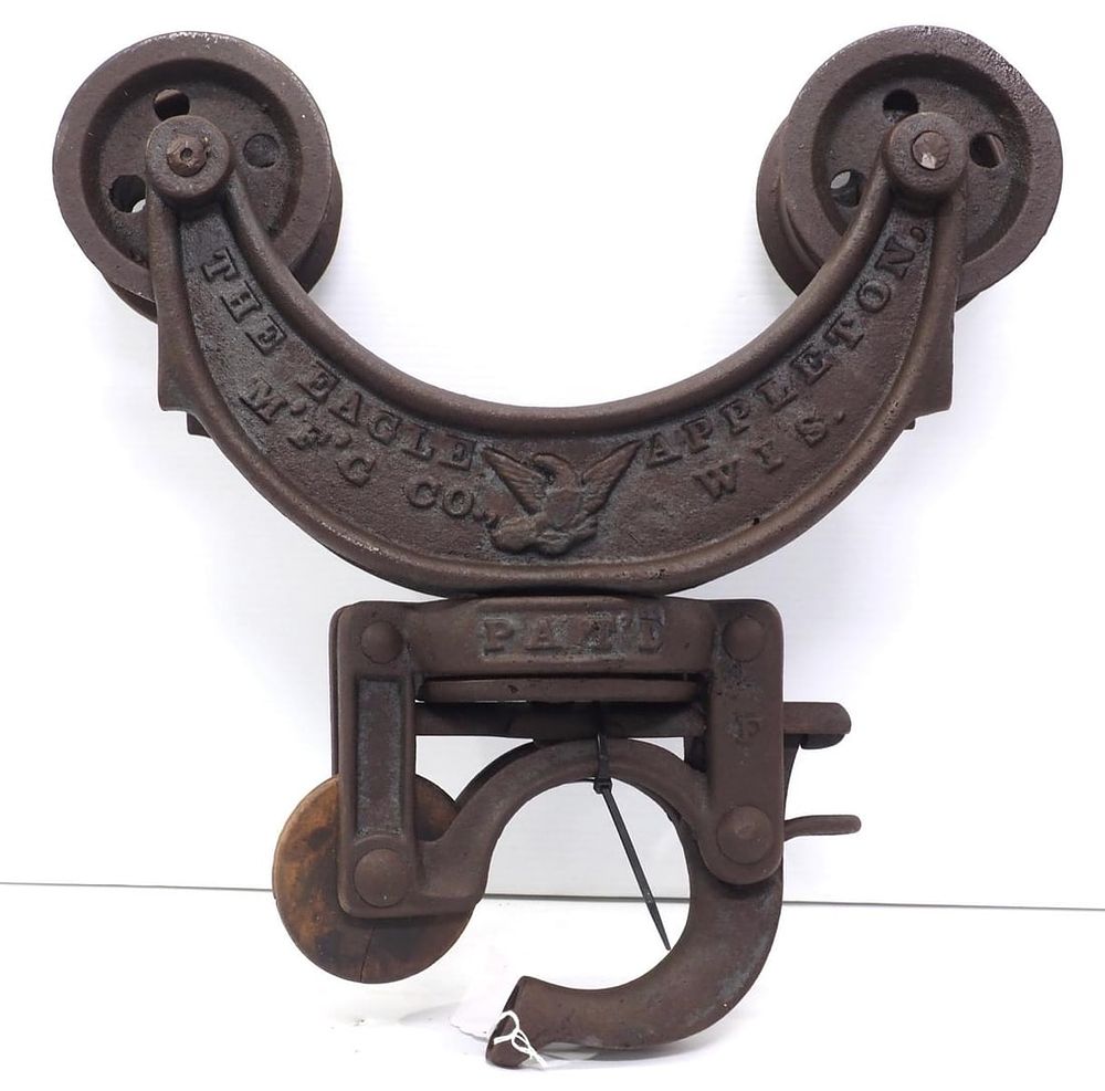 Lot 660: The Eagle cast iron hay carrier