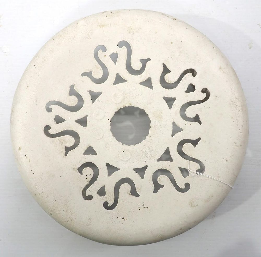 Lot 700: Round cast iron seat with unusual mount