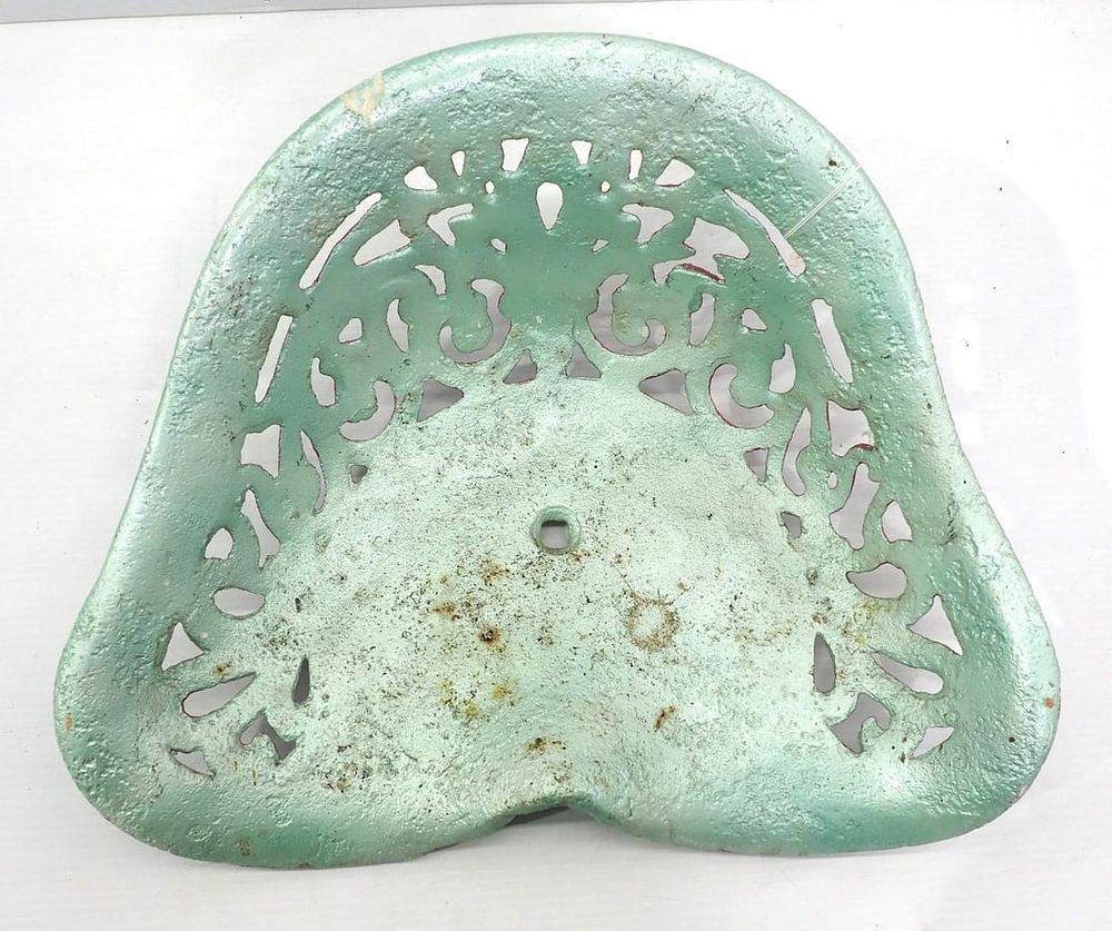 Lot 709: Cast iron seat with #398 on back