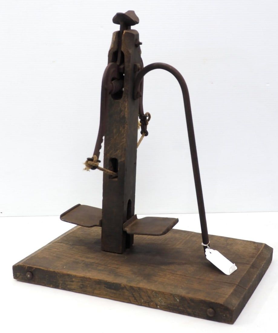 Lot 750: Early unusual foot-operated vise?