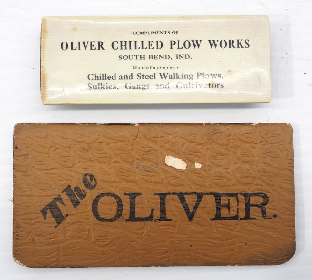 Lot 759: Oliver sharpening stone & 1900's pocket ledger
