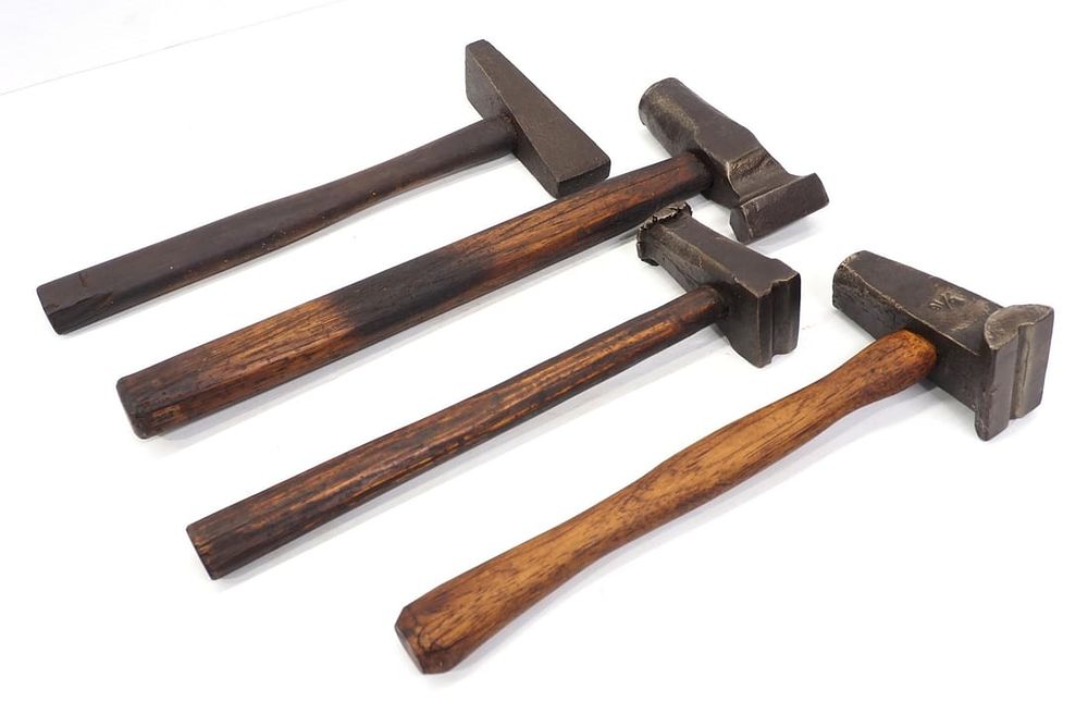 Lot 2213: (4) Blacksmith strikers