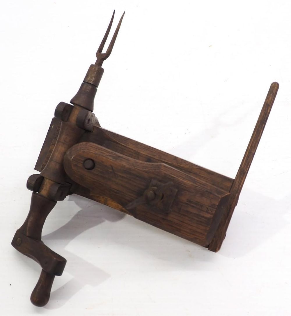Lot 169: Early wooden, unusual table-top apple peeler