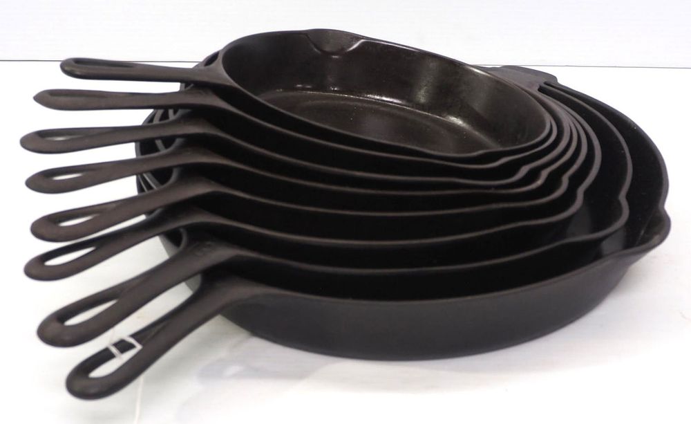 Lot 260: Set of 8 Griswold cast iron skillets