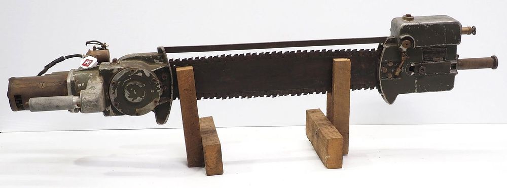 Lot 441: Military battery-powered chainsaw