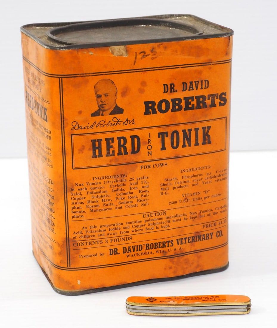 Lot 481: Allis Chalmers pocket knife / "Herd-Tonik" tin