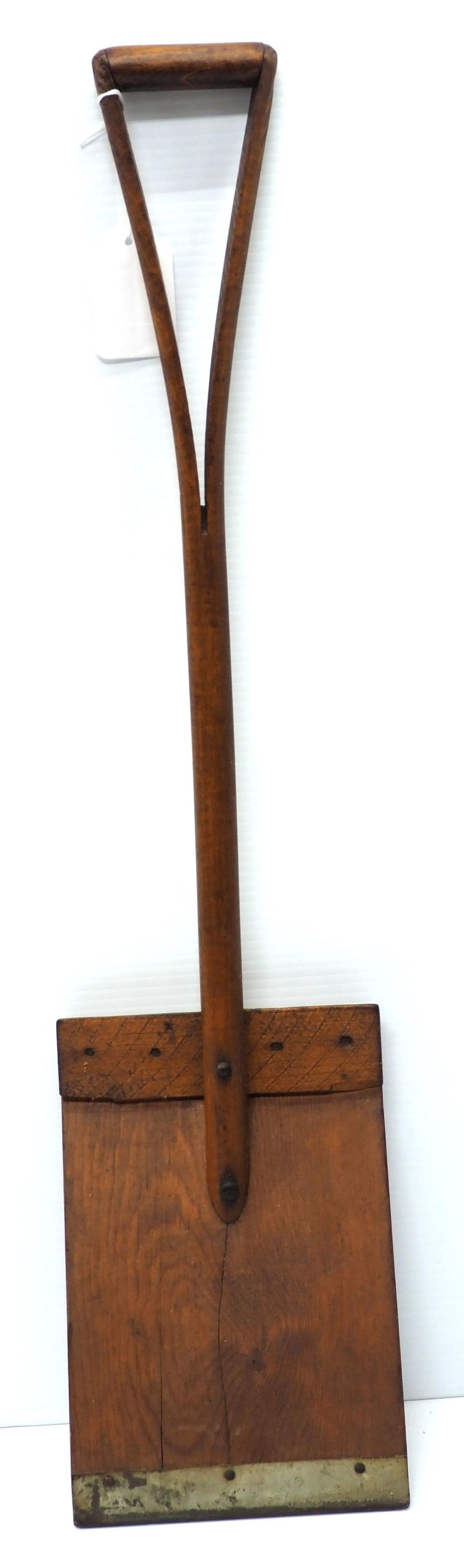 Lot 647: Unusual wooden child's shovel with tin edge