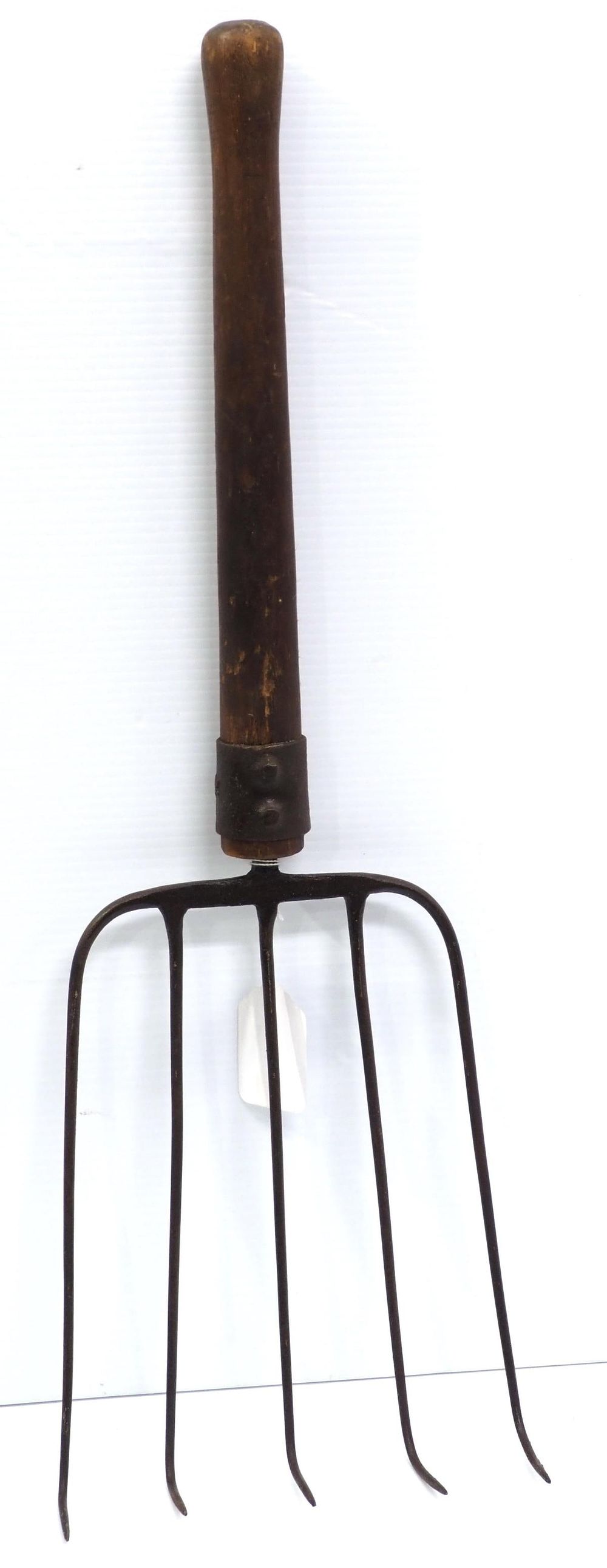 Lot 680: Unusual fork with bent tines, used for?