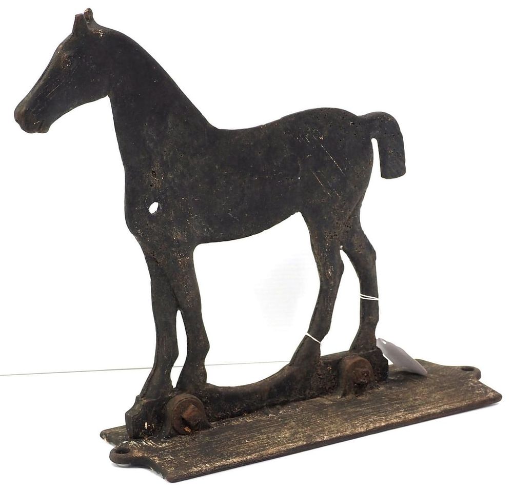Lot 843: Cast iron Dempster short-tail horse windmill weight