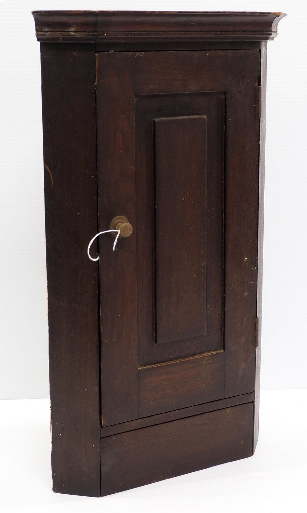 Lot 1215: Small wooden corner cupboard