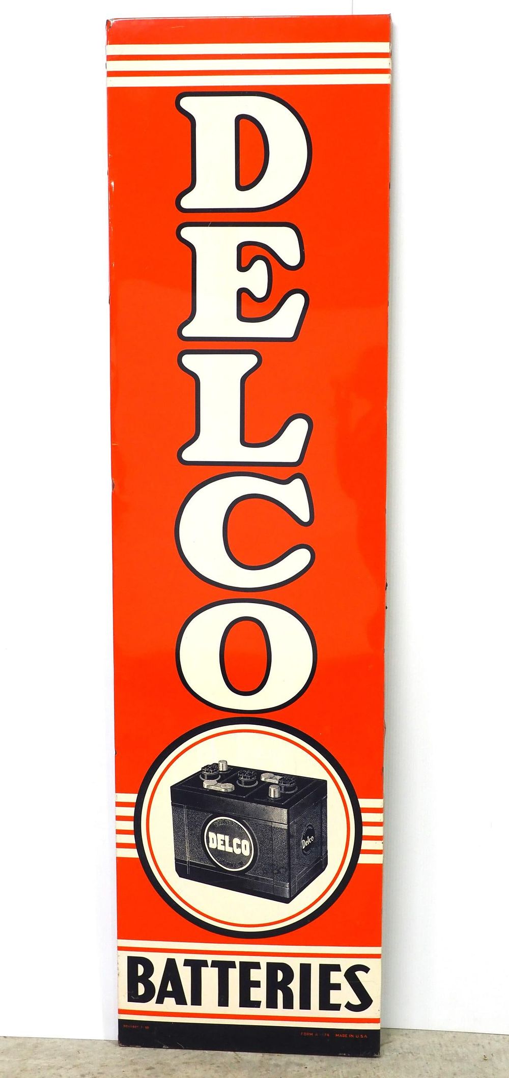Lot 1233: Delco Batteries sign