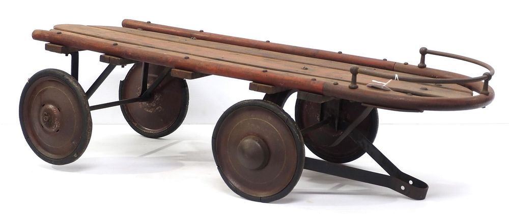 Lot 161: Wood & metal Streamliner sled with wheels
