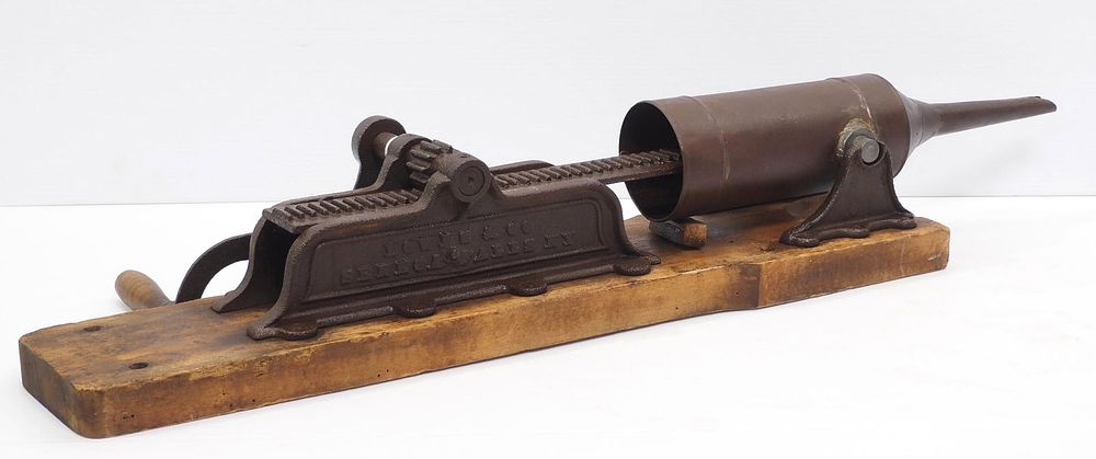Lot 410: Cast iron Downs & Co. table-top sausage stuffer