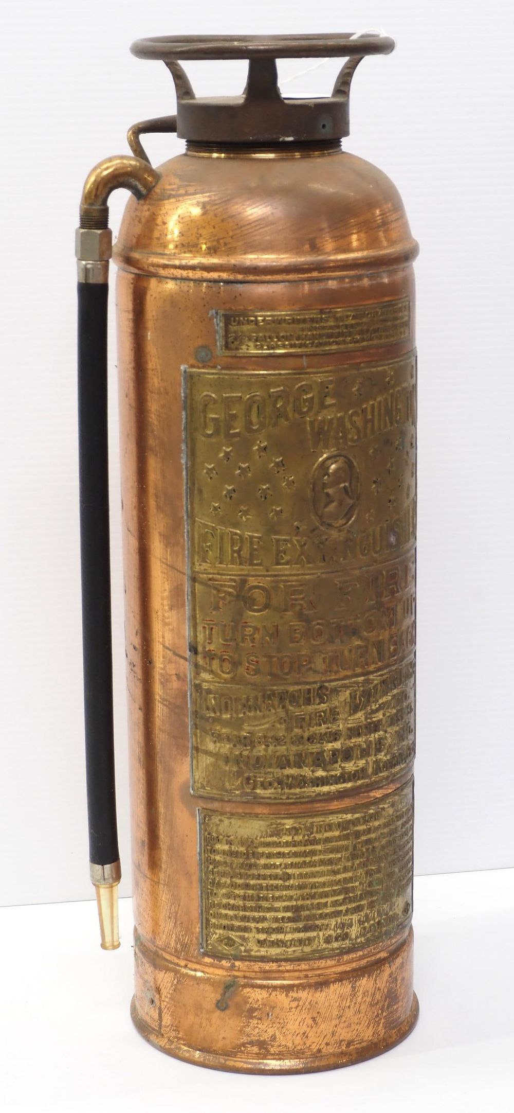 Lot 428: George Washington brass fire extinguisher