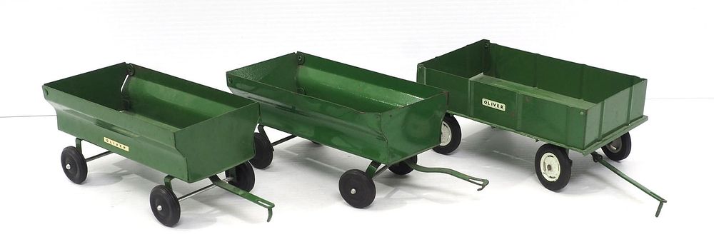Lot 17: (3) Ertl Oliver Wagons
