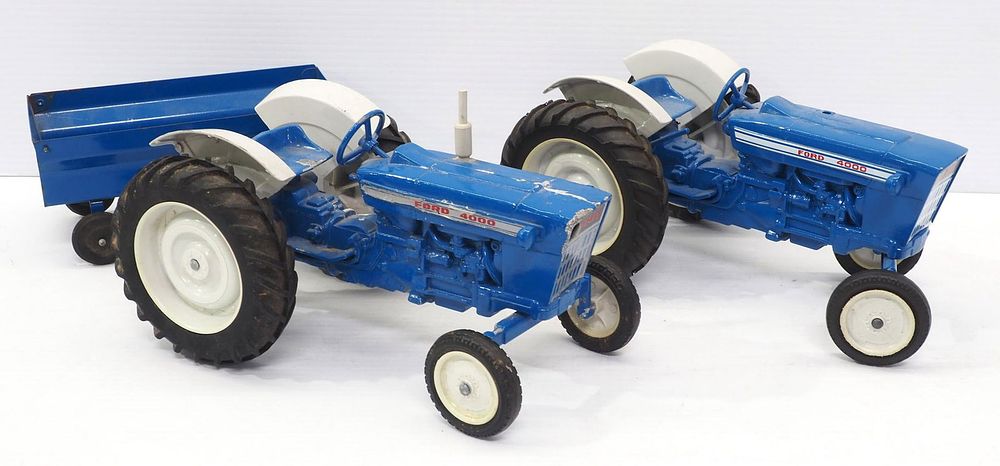 Lot 22: (2) Ertl Ford 4000 Tractors & (1) Ertl Wagon