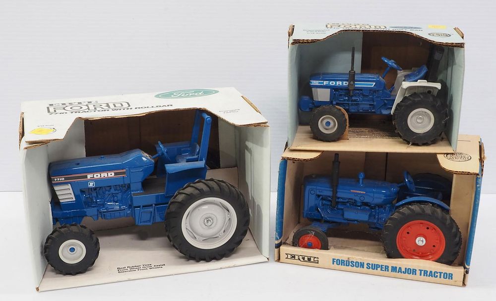 Lot 64: (3) Ertl Ford Tractors