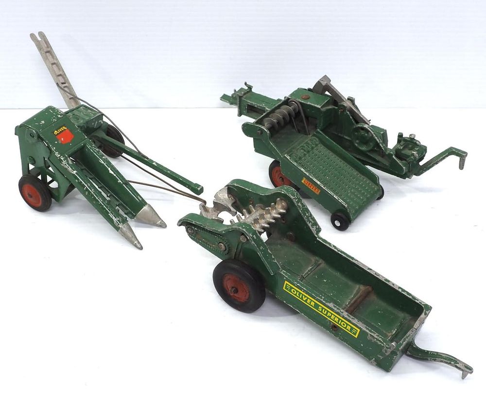 Lot 66: (3) Slik cast aluminum Oliver Implements