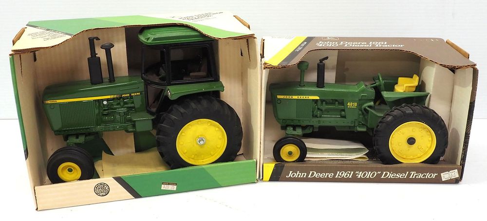 Lot 74: (2) Ertl John Deere Tractors