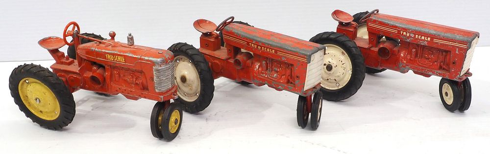Lot 98: (3) Tru-Scale Red Tractors