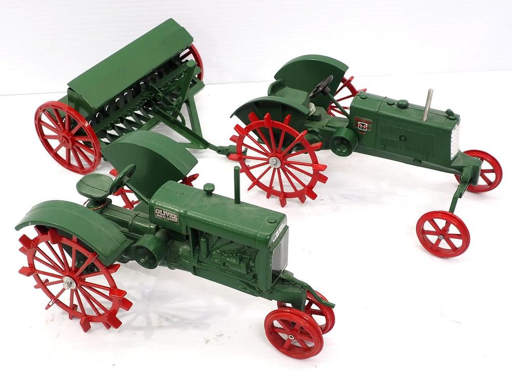 Lot 124: (2) Ertl Oliver Tractors & Oliver Grain Drill