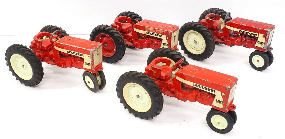 Lot 133: (4) Ertl Farmall 404 Tractors