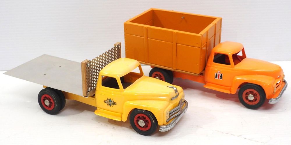 Lot 163: (2) Product Miniatures International Trucks
