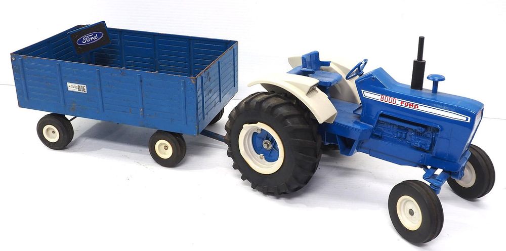 Lot 173: Ertl Ford 8000 Tractor, Forage Wagon & sign