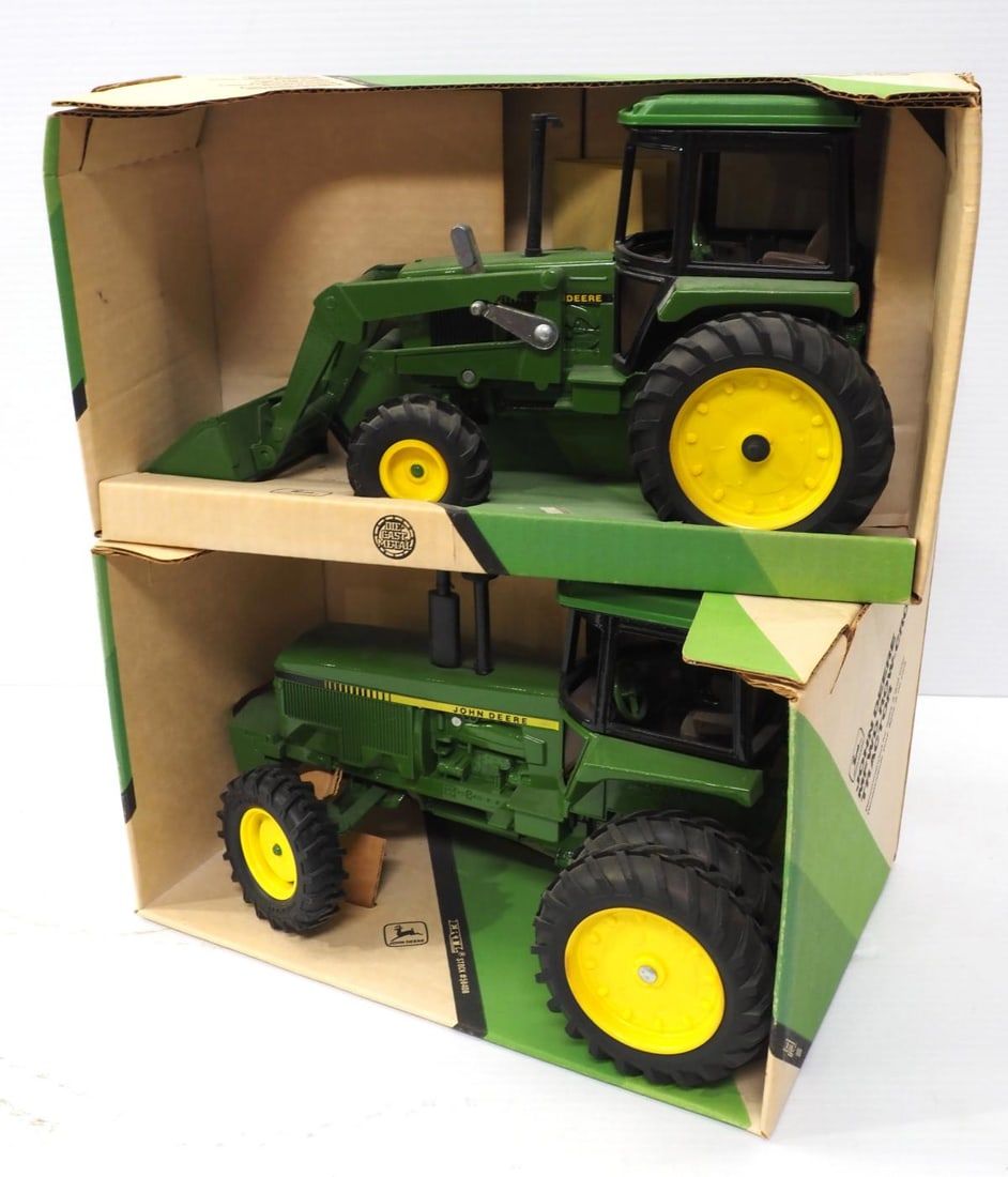 Lot 198: (2) Ertl John Deere Tractors