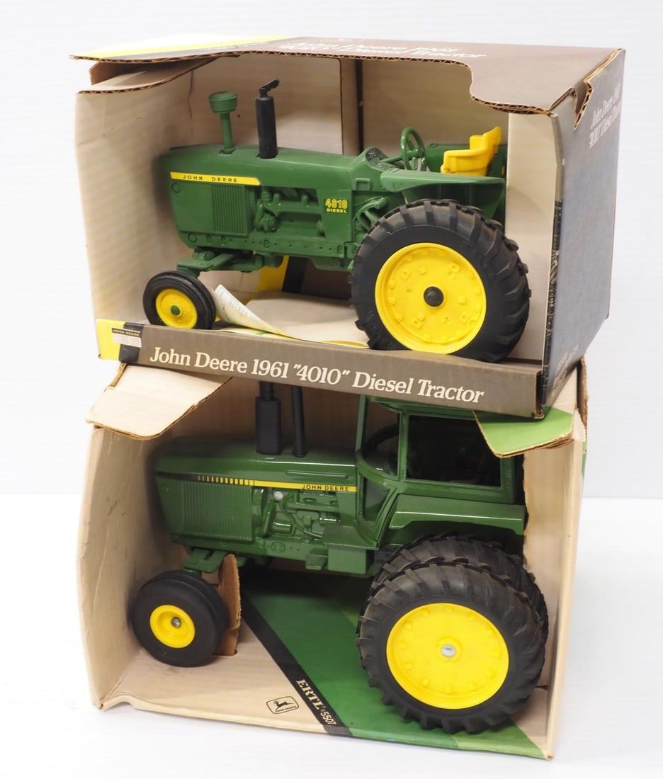 Lot 200: (2) Ertl John Deere Tractors