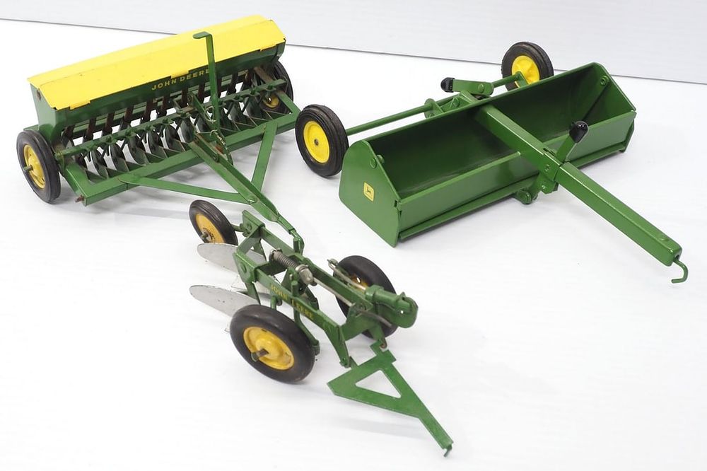 Lot 259: (3) Ertl John Deere Implements