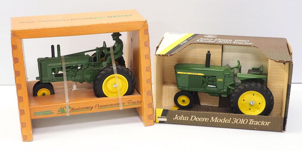 Lot 329: (2) Ertl John Deere Tractors