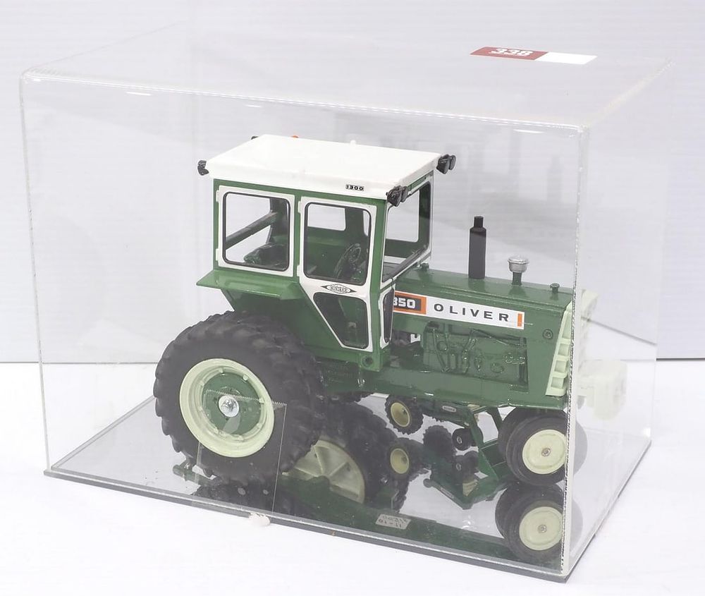 Lot 338: Custom Oliver 1850 Tractor with Hiniker Cab