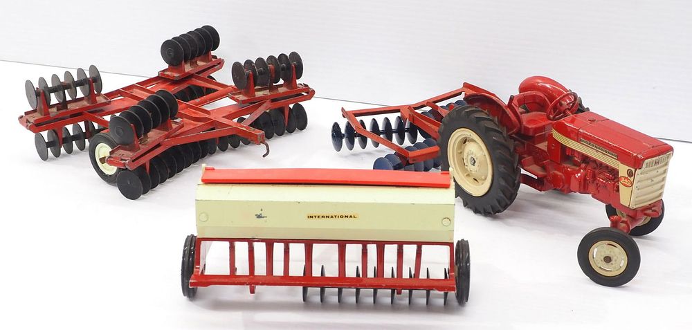 Lot 347: International 340 Utility Tractor & Implements