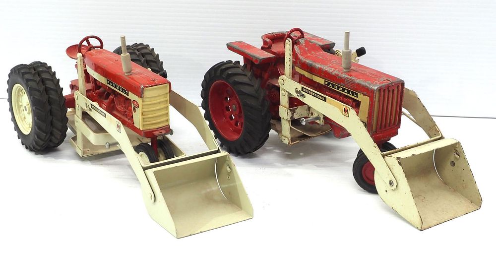 Lot 352: (2) Ertl Farmall Tractors with Front End Loaders