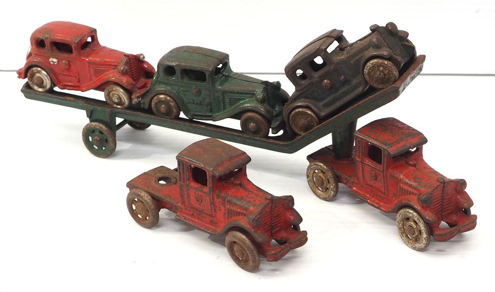 Lot 21: Cast iron truck with car carrier trailer