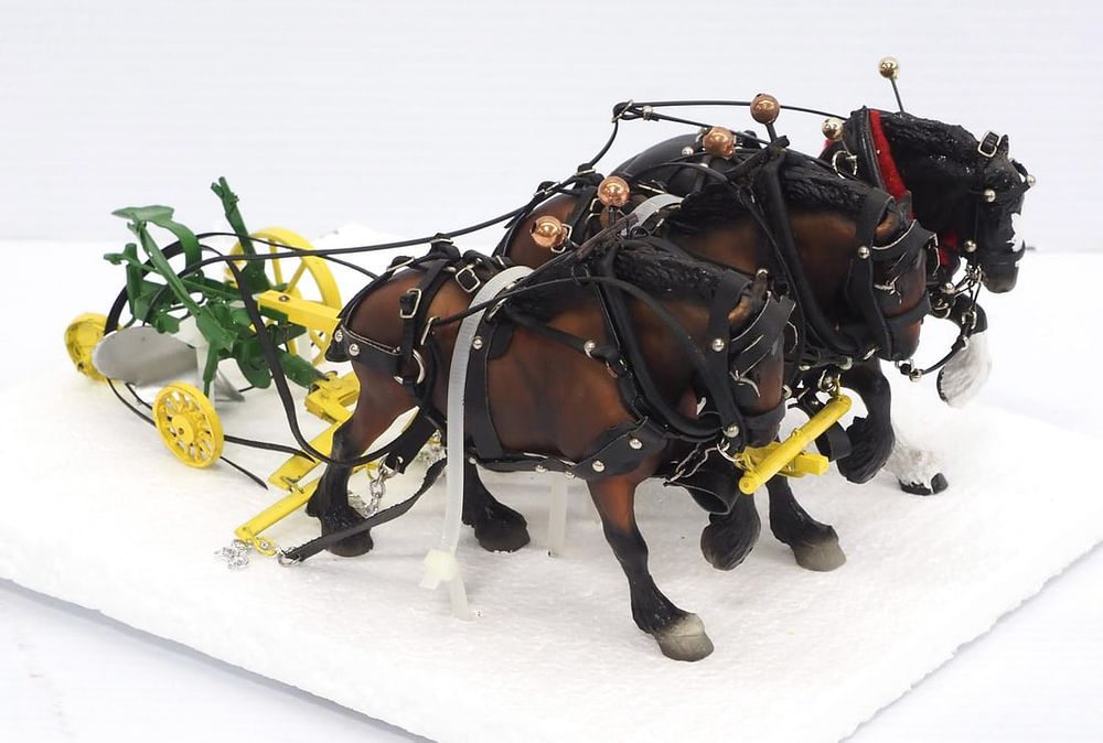 Lot 146: Custom made plow hitched to (3) horses