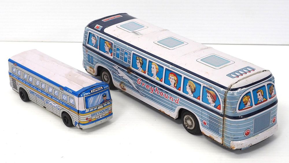 Lot 231: (2) Tin friction Greyhound buses