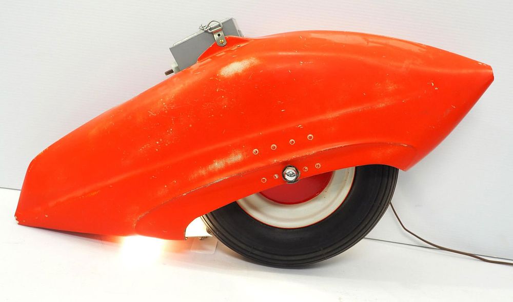 Lot 199: Lighted fiberglass fender and tire display