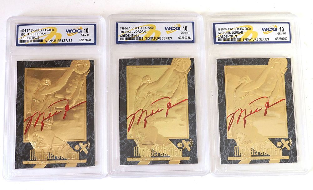 Lot 104: (3) 1996-97 SkyBox EX-2000 Michael Jordan