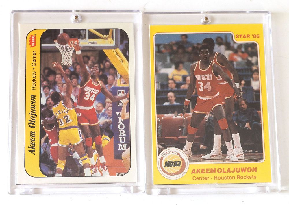 Lot 125: 1986 Fleer Akeem Olajuwon Card #9 / 1986 Star Akeem Olajuwon