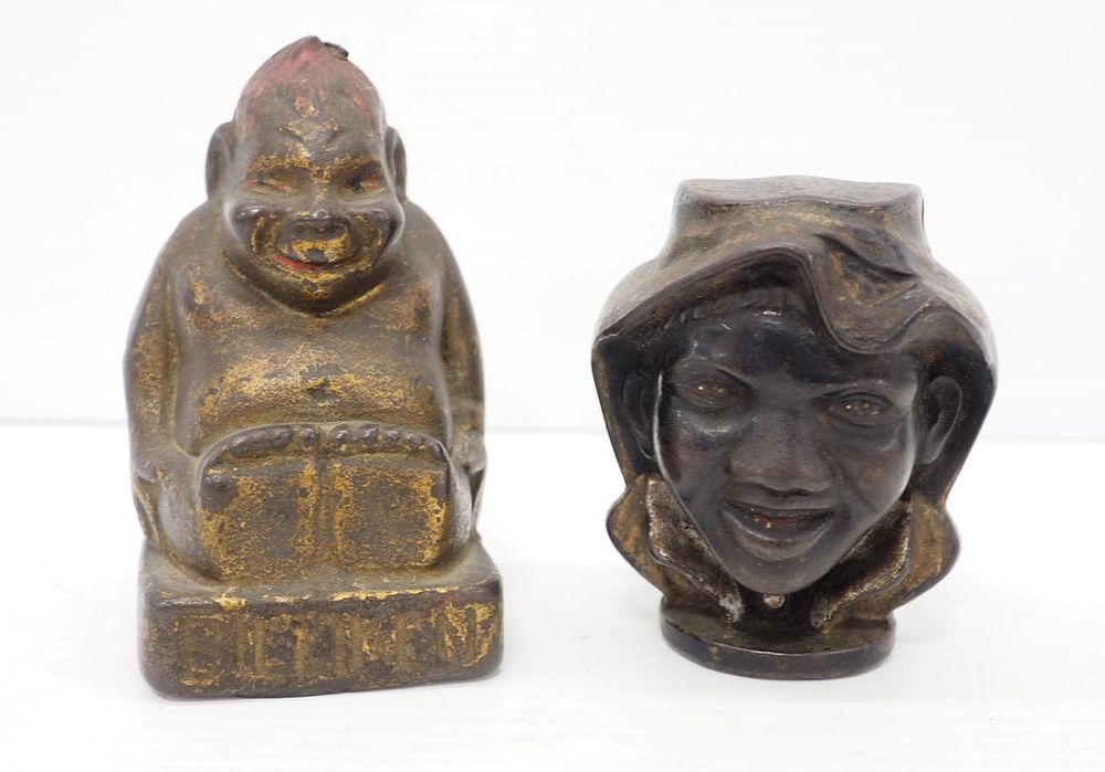 Lot 75F: Cast iron Billiken Ape and double face banks