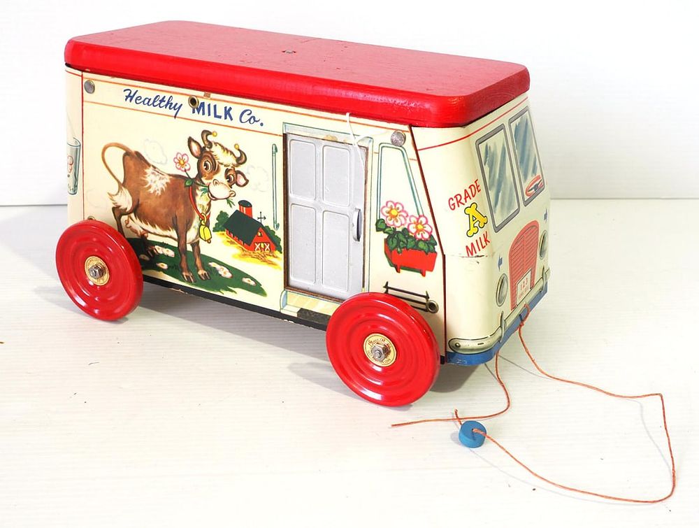 Lot 91: Gong Bell Healthy Milk truck pull toy