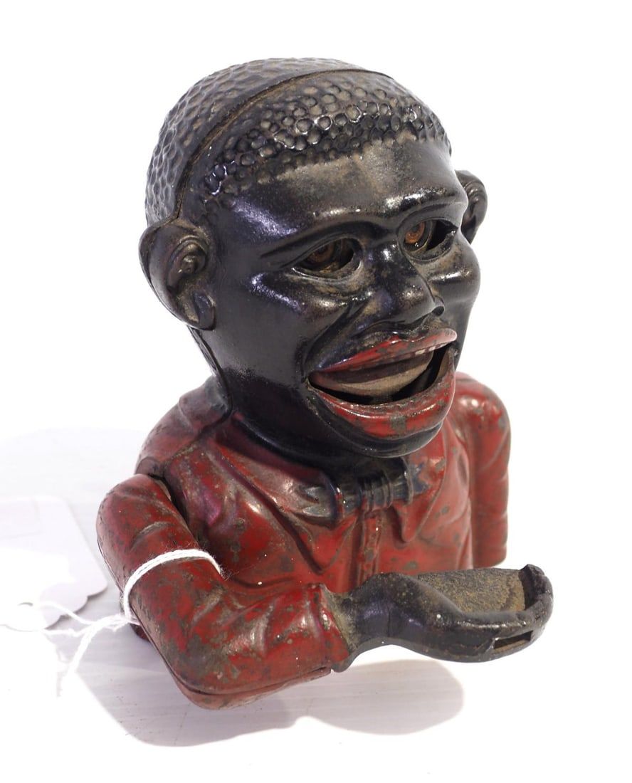 Lot 142: Cast iron Little Joe mechanical bank