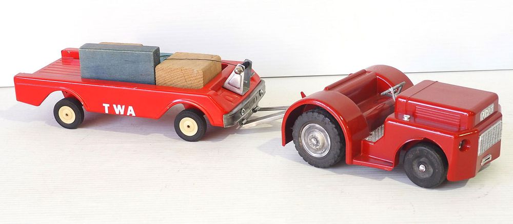 Lot 288: Doepke airport tractor with custom Nylint trailer