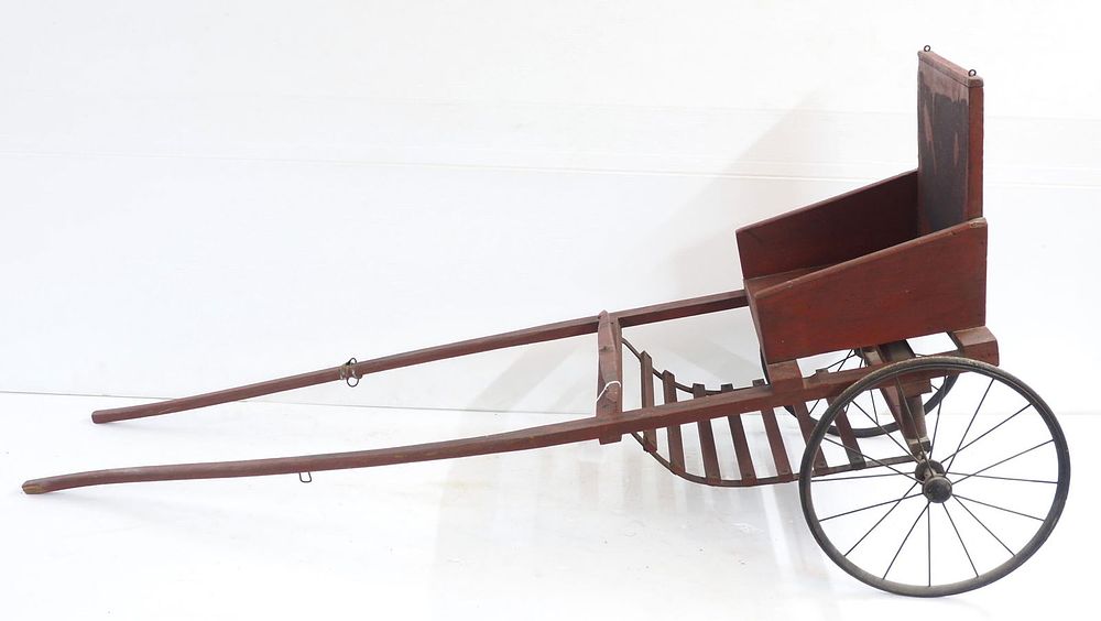 Lot 1078: Early wooden child's goat/dog sulky