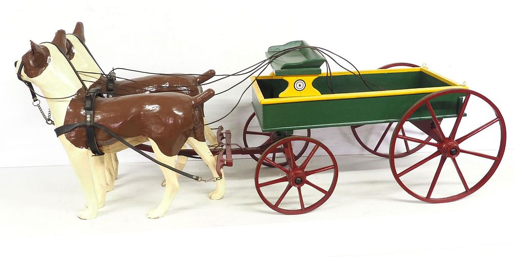 Lot 1193: Craftsman dogs hitched to a restored child's wagon