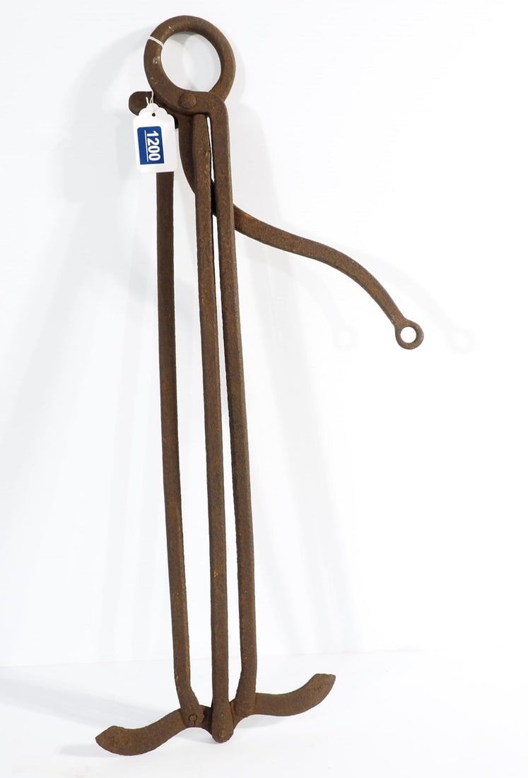 Lot 1200: Unusual single-hook hay spear