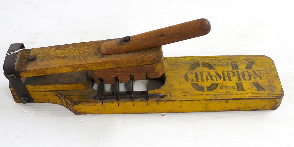Lot 151: Primitive wooden potato cutter